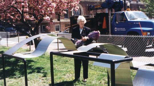 Sculptor Miriam Knapp at her installation, “Mary Lou” in 2000 next to the Bates Art Center